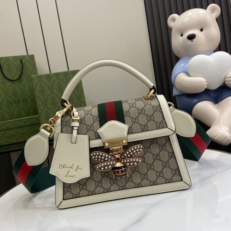 G*u*i top handle bags